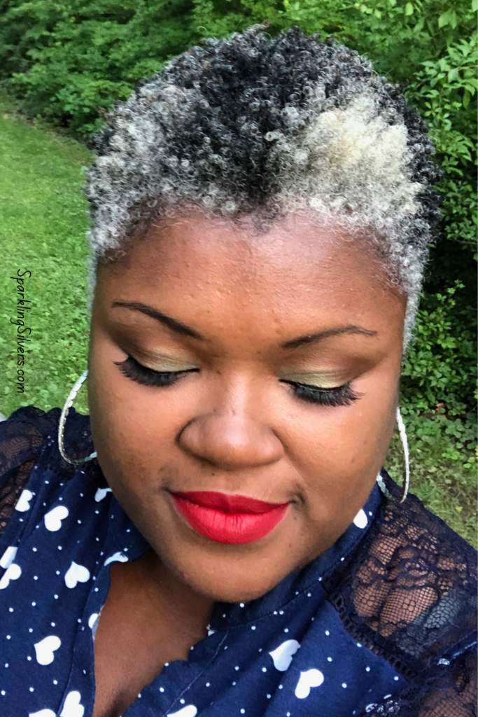 Afro American woman with salt and pepper hair
