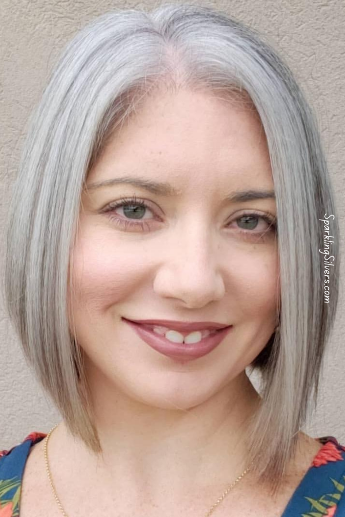 Dark brown hair transitioned to grey hair