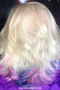medium length white hair with purple tips