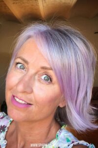 image of a woman with hazel eyes and purple hair
