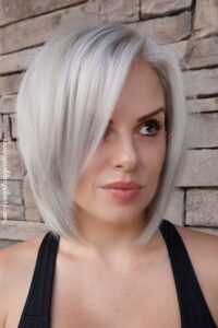 Sleek bob hair with grey hair color