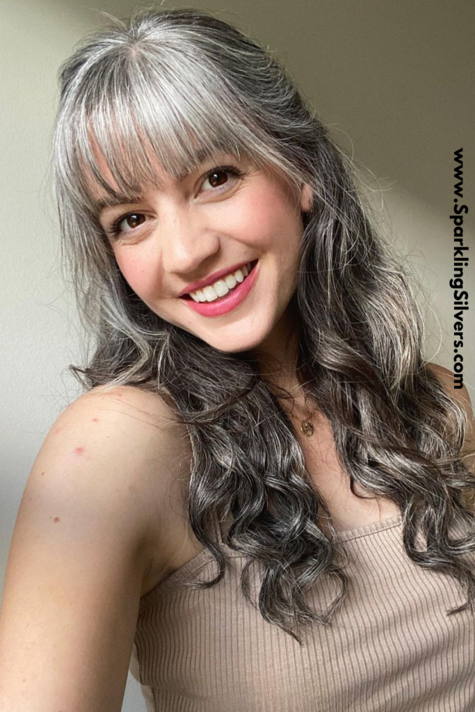 Long gray hair with bangs
