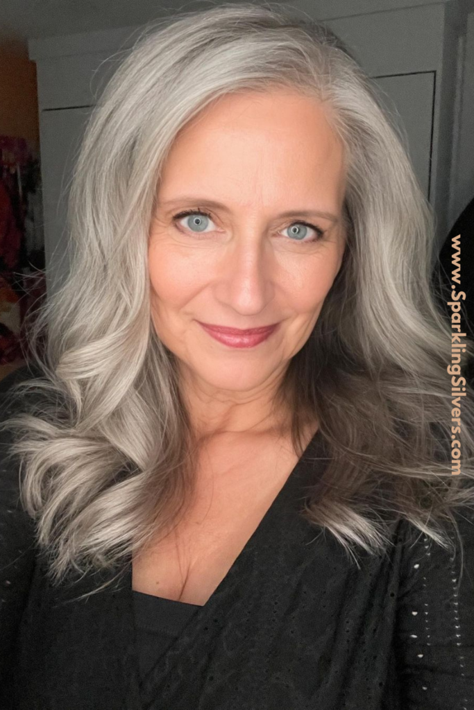 Long grey hairstyle side parted
