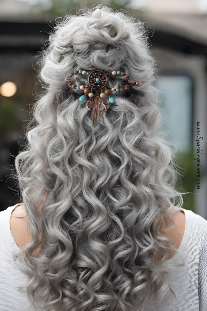 Long curly gray hair with a hair clip